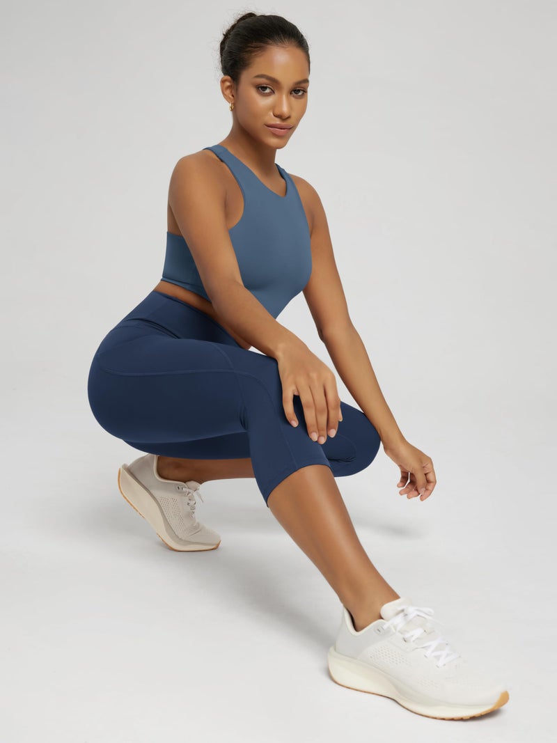 ODODOS Women's High Waisted Yoga Capris with Pockets,Tummy Control Non See Through Workout Sports Running Capri Leggings, Plus Size, Navy,XX-Large - Image 2
